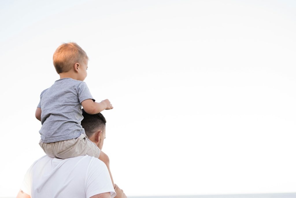 Son On Father's Shoulders
