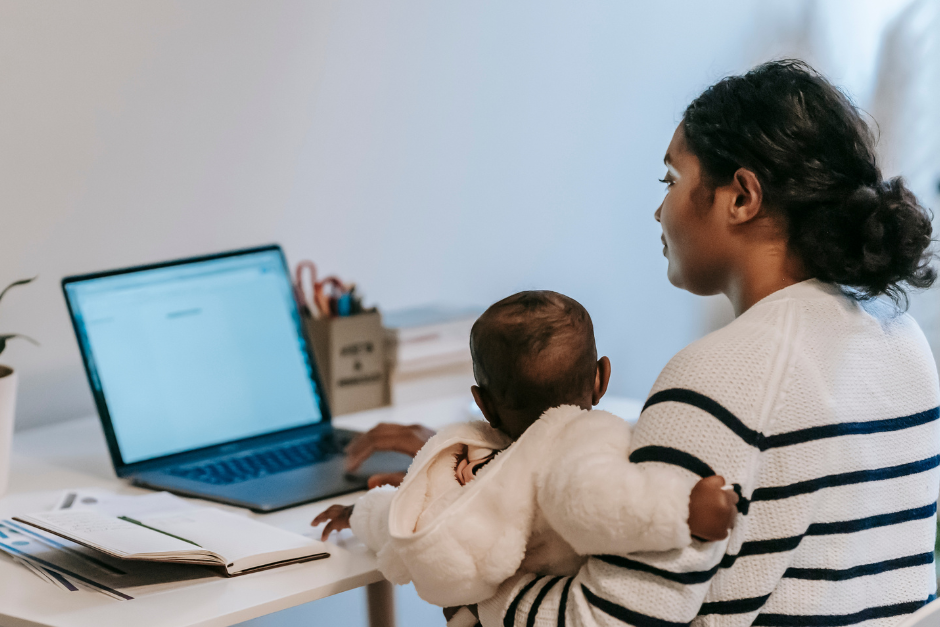 woman working from home with a child