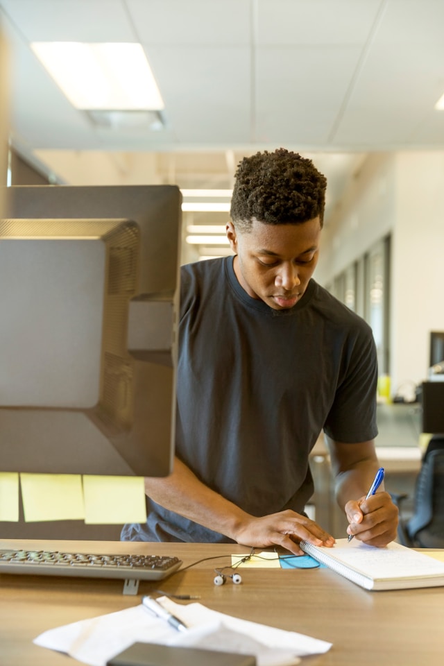 Person Working At Standing Desk