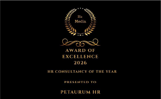 Black certificate with gold laurel and text reading: "Award of Excellence 2026, HR Consultancy of the Year, presented to Petaurum HR" with an Ez Media logo at the top.